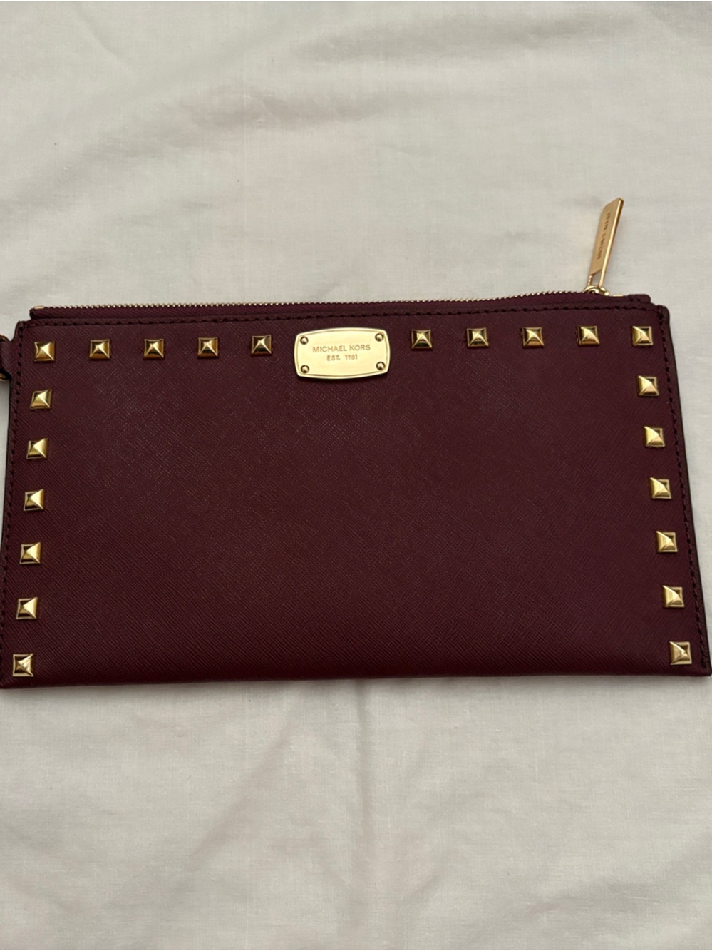 Michael Kors Wine Red Saffiano Wristlet with Gold Studs